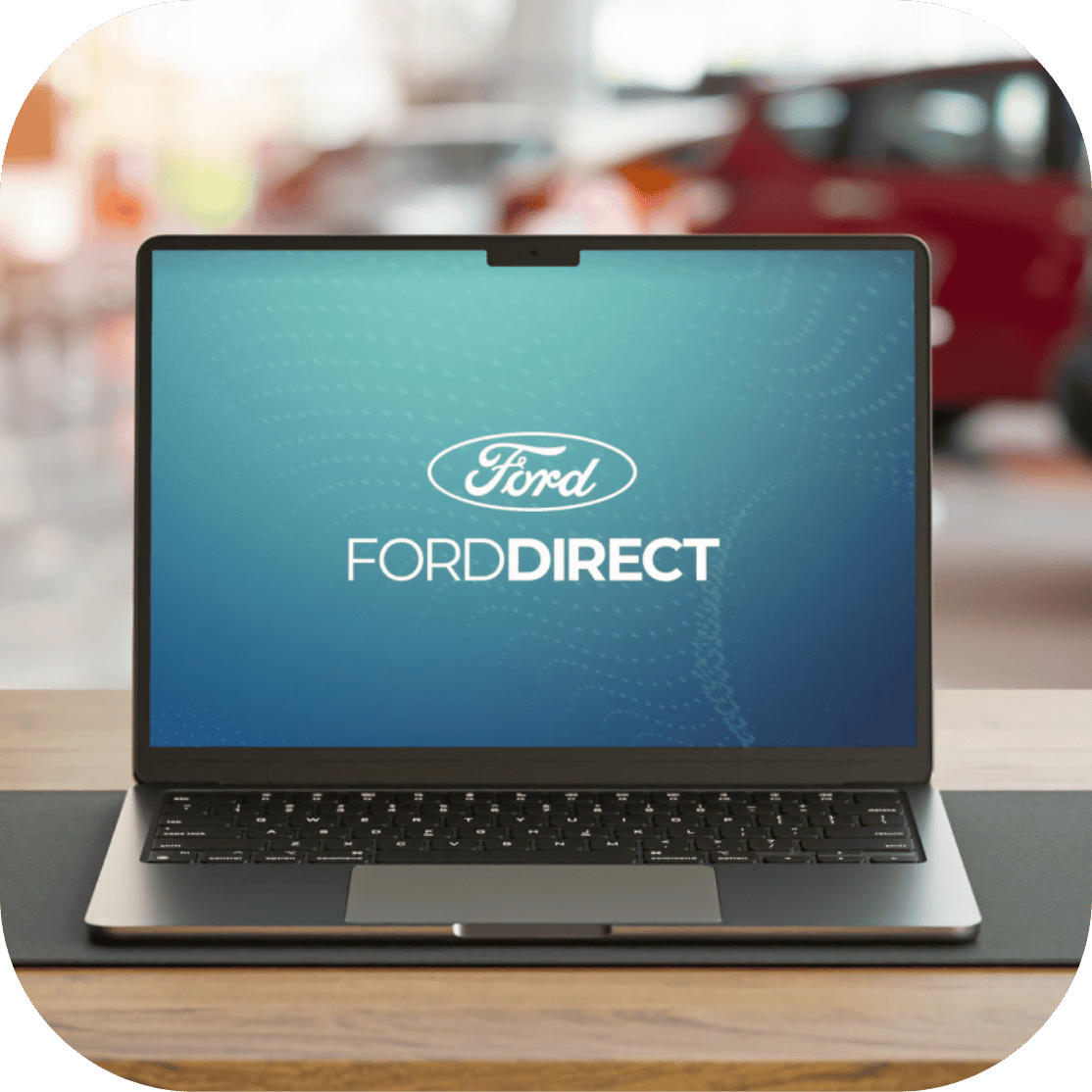 A laptop with the FordDirect logo