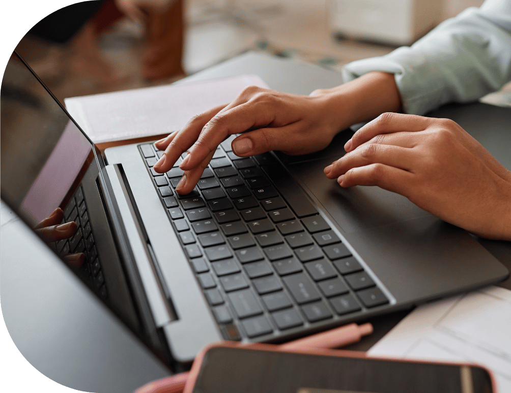 Person typing on a laptop