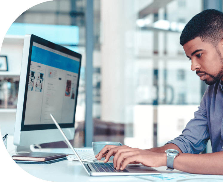 A man typing on a computer