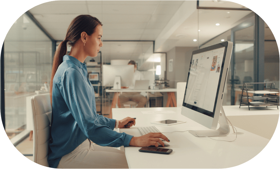 A woman working on a desktop