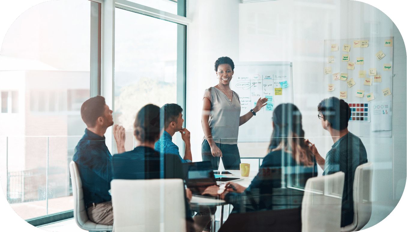 A woman presenting in a meeting