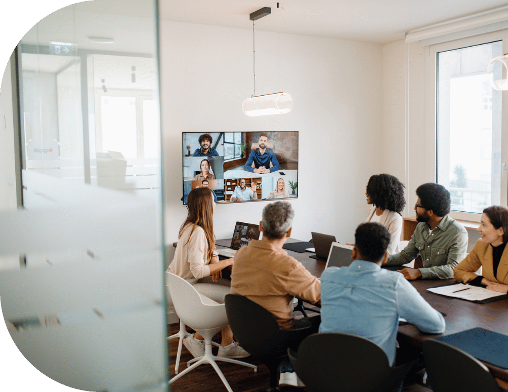 A group in an office in a meeting