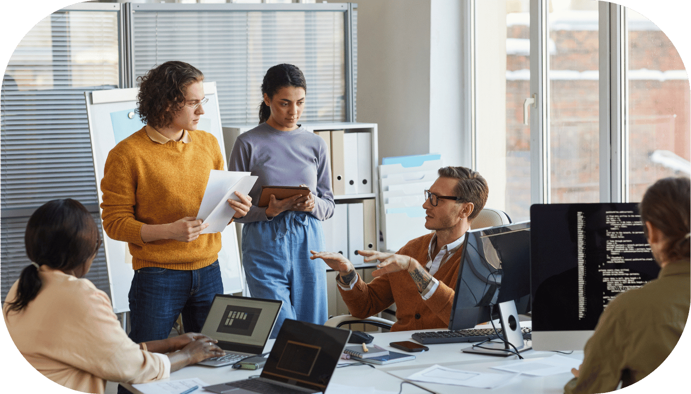 Five coworkers in a meeting
