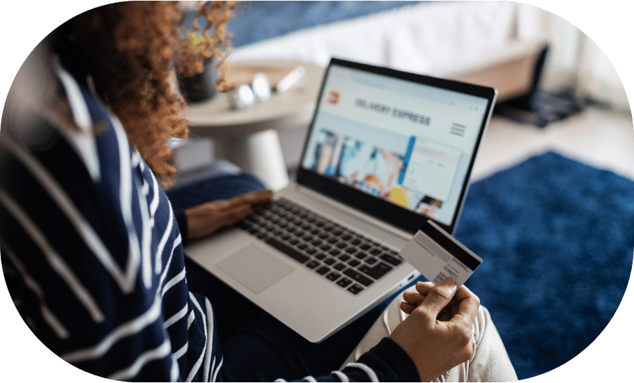 Woman shopping online with credit card