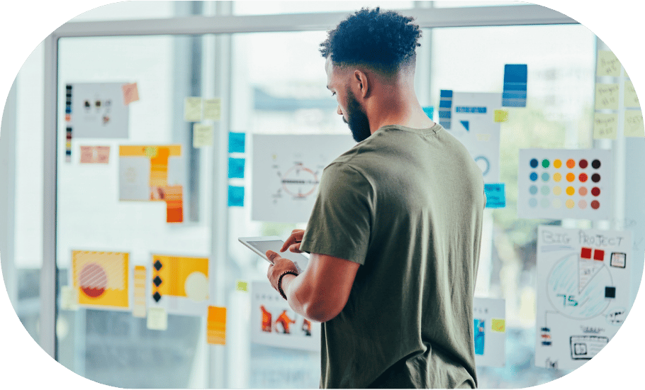 A man looking at a tablet