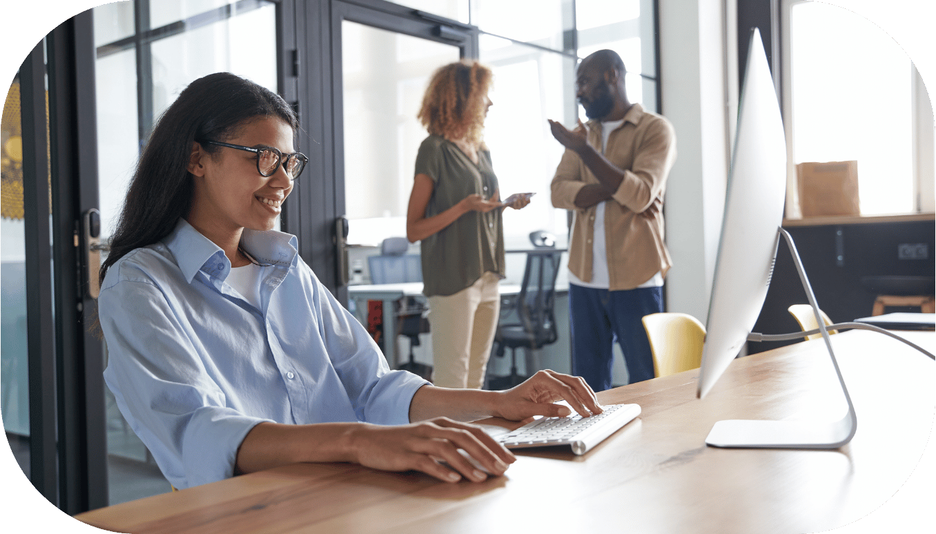 Woman typing at her desk